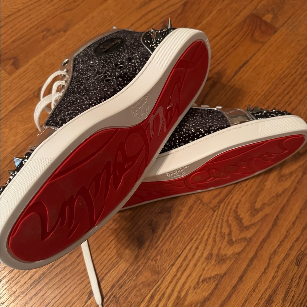 Christian Louboutin Black Spiked Sneakers with Red Soles